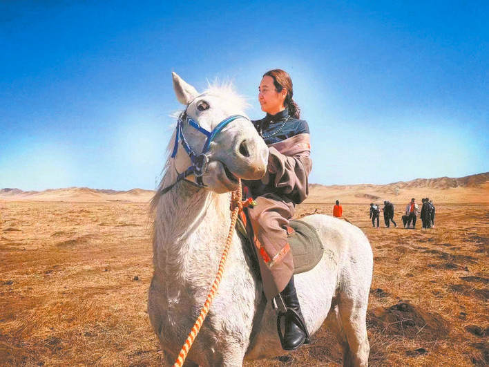 唐克“酒店第一人”程秀芳的黄河情